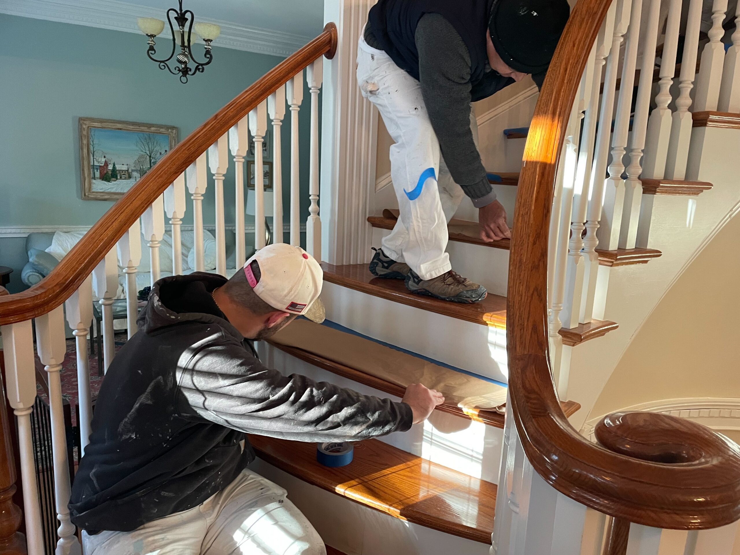 Seamless interior house painting process by Fayetteville, North Carolina professionals.